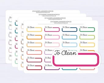 May include: A sheet of rectangular planner stickers featuring the text To Clean in black script. Each sticker has a colored border in shades of red, pink, orange, yellow, green, blue, and purple. The brand name STICKERPLANNERSHOPCO is printed at the top.