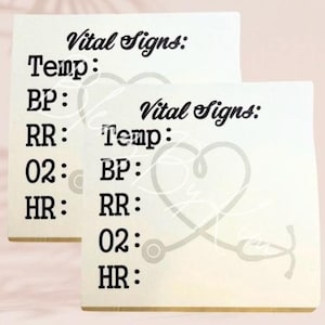 May include: Two white sticky notes with black text. The top note has the text "Vital Signs: Temp: BP: RR: 02: HR:". The bottom note has the text "Vital Signs: Temp: BP: RR: 02: HR:" and a black and white illustration of a stethoscope and heart.