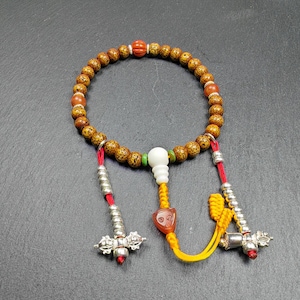 Mala de muñeca tibetano con cuentas de semillas de loto: ágata Nanhong, vajra de plata, oración budista