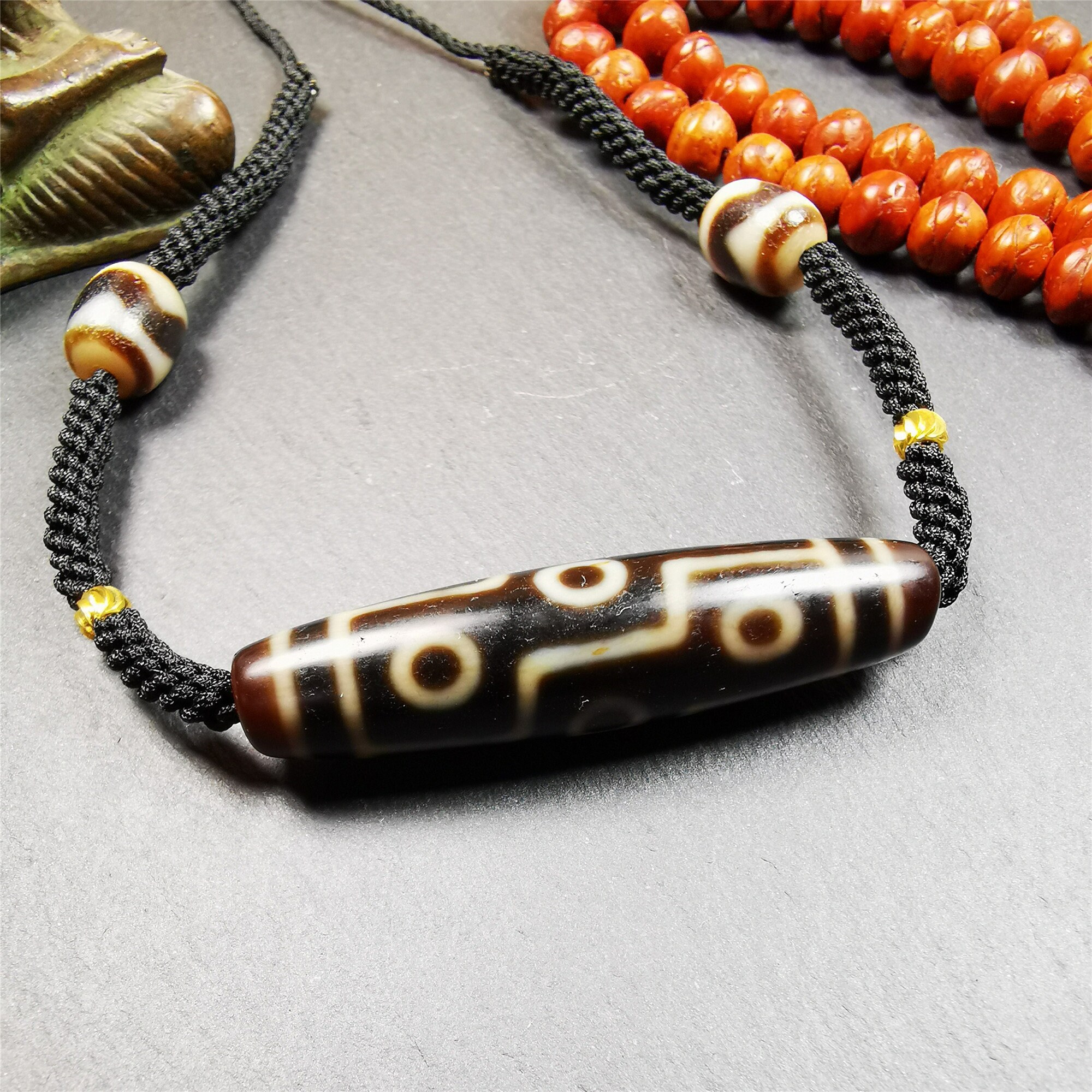 Gandhanra Antique Tibetan 9 Eyed Dzi Bead Necklace, 2.1 Gandhanra Antique Tibetan 9 Eyed Dzi Bead Necklace, 2.1