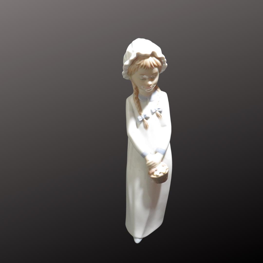 NAO Lladro #597 Girl With Braids Holding Basket of Sweets