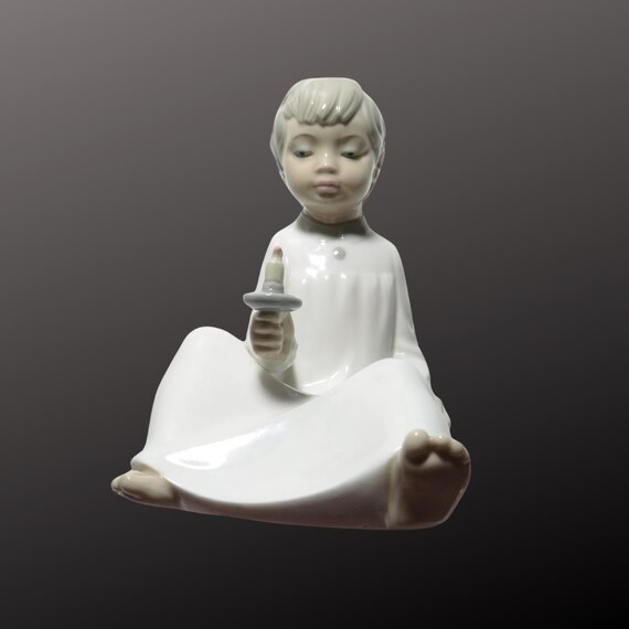 Boy and Girl Porcelain Hand Crafted Figurines From NAO Spain