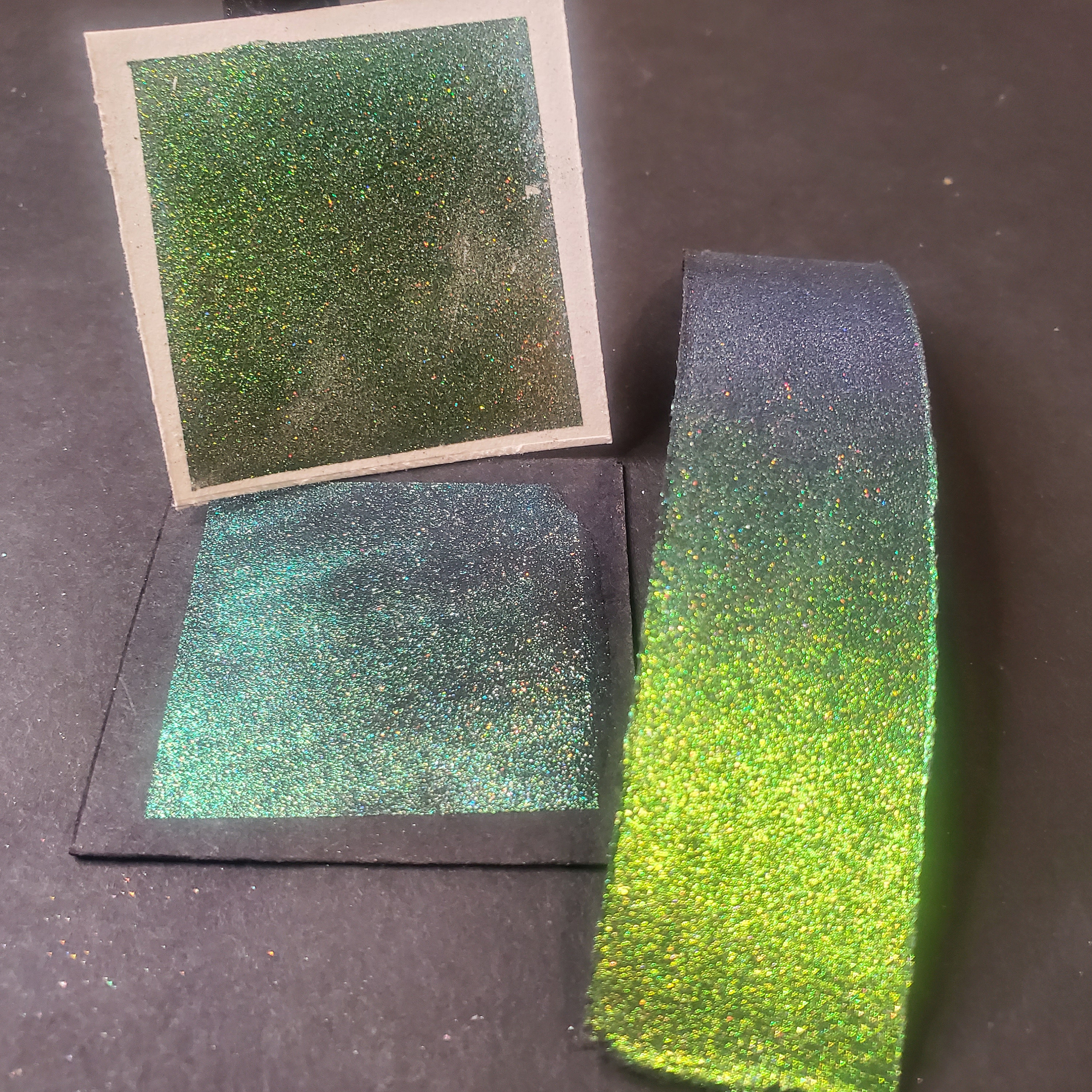 Tropics, a colorshifting holographic handmade watercolor paint shifts from purple to green