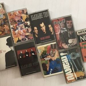 Trío Alcalino Nueva Gloria Encontrada Planeta Tierra NOFX Rancio - Casete de Audio