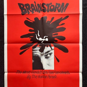 May include: A red and black movie poster for the film "Brainstorm". The poster features a large black ink splatter with a silhouette of a person falling into it. The text "The Most Fiendish Idea Ever Conceived By The Human Brain!" is printed below the splatter. The poster also features the names of the actors, Jeff Hunter, Anne Francis, Dana Andrews, and Viveca Lindfors.