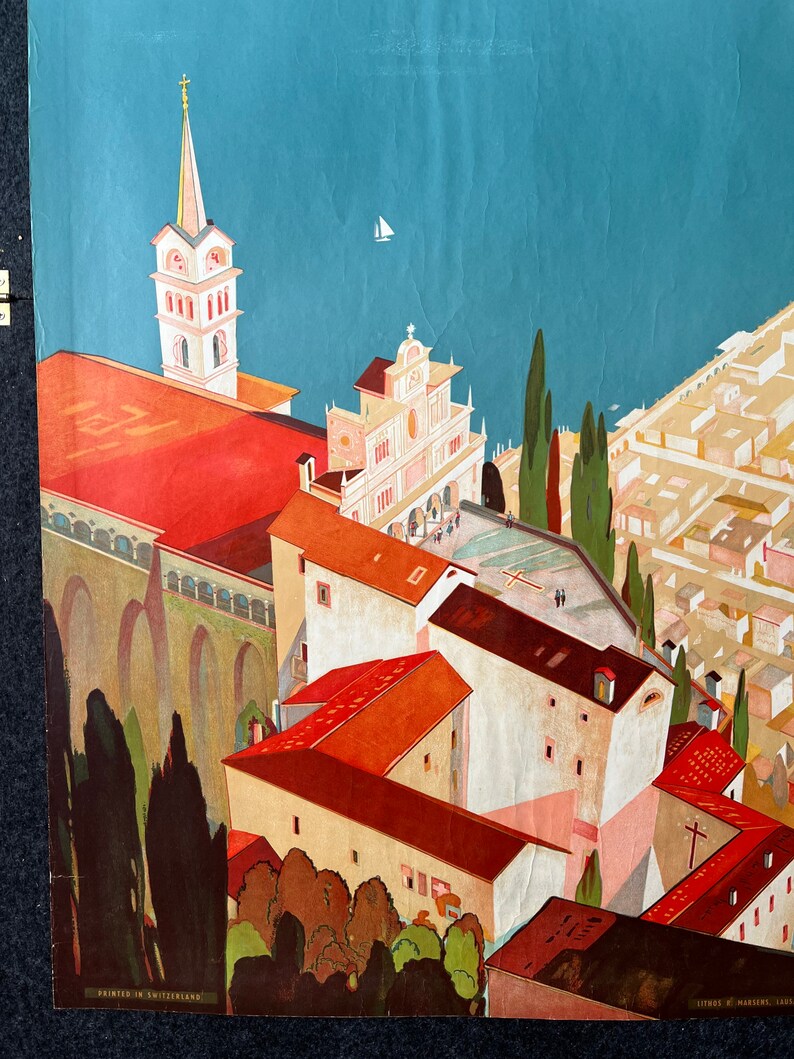 May include: A vintage travel poster featuring a colorful illustration of a cityscape with a church and a lake. The poster has the text "Printed in Switzerland" in the bottom left corner and "Litho. & Maromme, Zurich" in the bottom right corner.