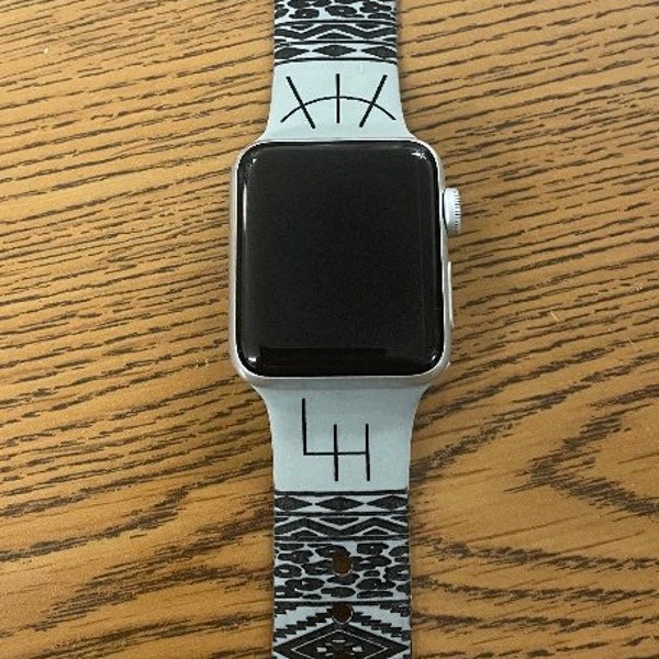 Aztec engraved cattle branded custom silicone band is Apple compatible.