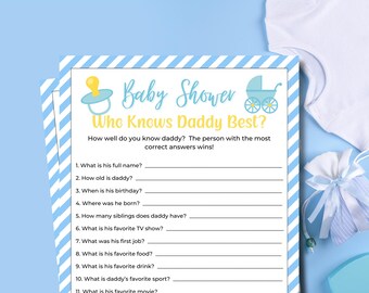 May include: A Baby Shower Who Knows Daddy Best game card with a blue and white striped border, featuring a yellow pacifier and blue baby carriage icon. The text includes ten numbered questions about daddy, printed on white paper.