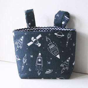 small handlebar bag blue rockets in space, balance bike bag, playpen utensils, tricycle bag, bicycle basket, bed basket for baby bed