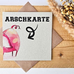 Arschkarte – Witzige & nachhaltige Postkarte aus Graspapier – Freches Schweinchen Arschkarte – Humorvolle Karte für jede Gelegenheit