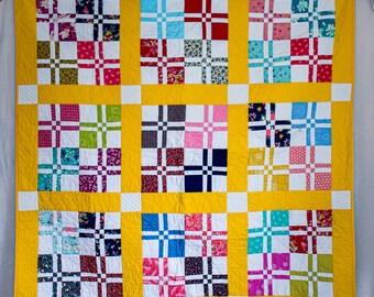 Sunny Checkerboard Quilt: Handmade Patchwork Throw, Rainbow Cotton