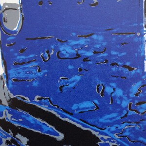 May include: Abstract art print with a blue background and black and gray shapes. The print has a textured look, like it was created with a screen printing technique.