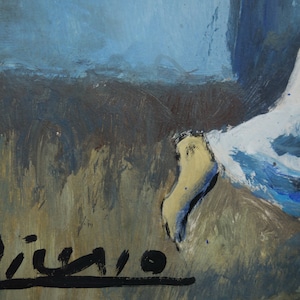 May include: A close-up of a painting with a blue and white figure in the background. The signature "Picasso" is visible in black paint in the lower right corner.