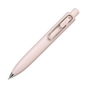 May include: A pale pink mechanical pencil with a silver clip and a silver tip. The pencil has the word "uni" printed on the side.