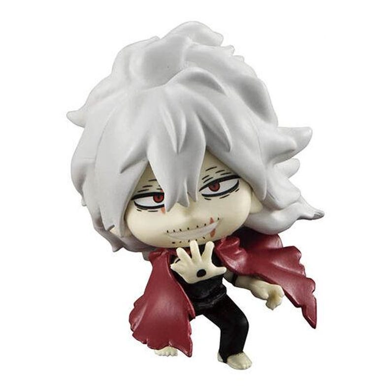 May include: A chibi-style figurine of a character with white, spiky hair and red eyes. The figure wears a dark outfit with a red cape. The character has a stitched mouth and a menacing expression.