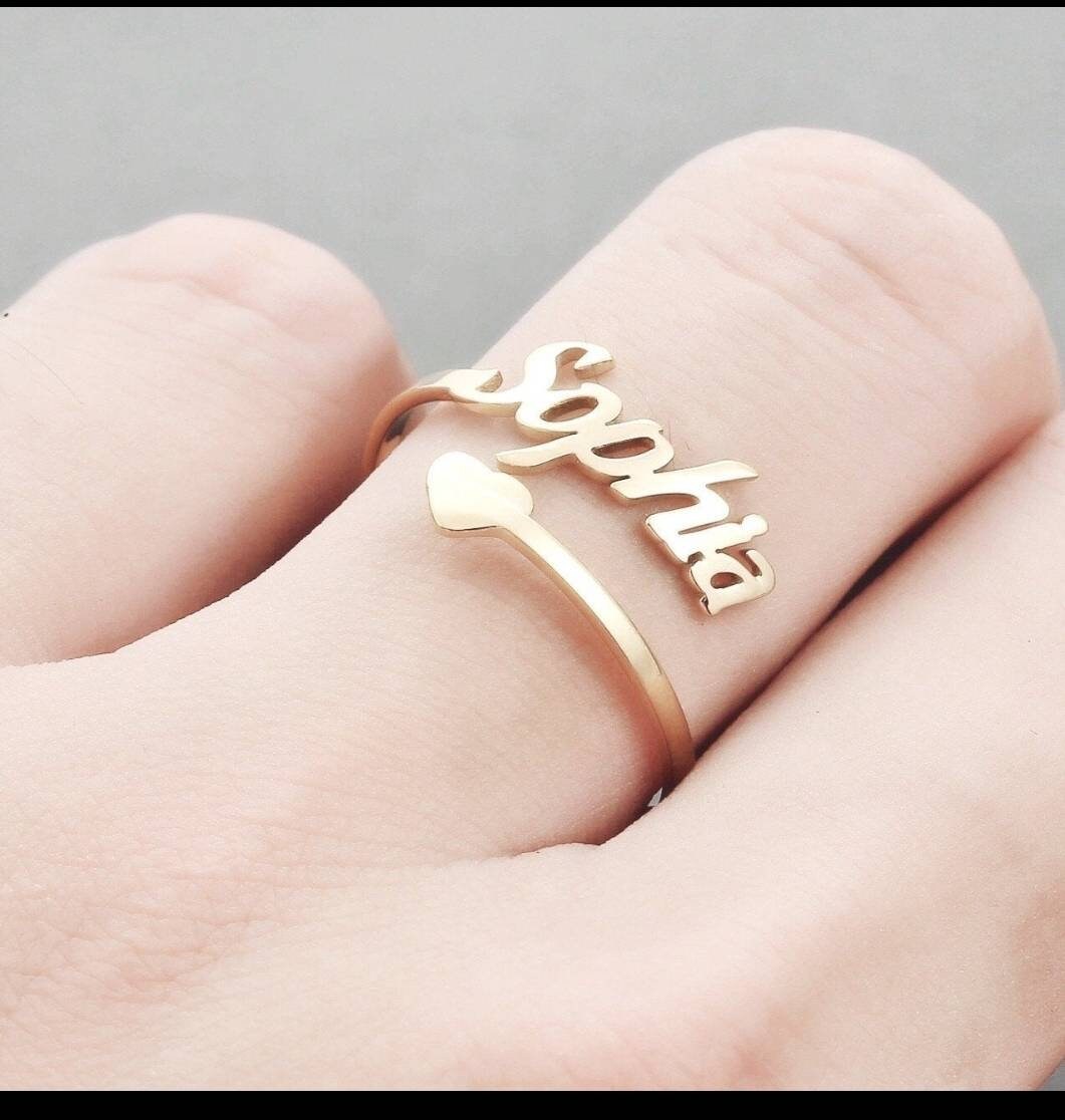 Adjustable clearance name rings