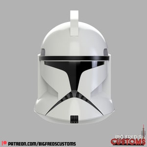 Puede incluir: Casco de soldado clon blanco de plástico con visera y marcas negras. El casco tiene una cresta elevada en la parte superior.