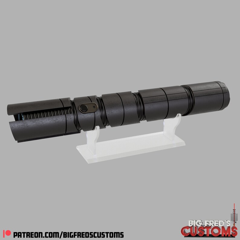May include: A black lightsaber prop with a textured metal finish, displayed on a white stand. The lightsaber is made up of multiple sections that can be assembled and disassembled.