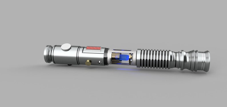 May include: A silver lightsaber with a blue blade, showing the internal workings of the lightsaber. The lightsaber has a black and red control panel and a silver handle.