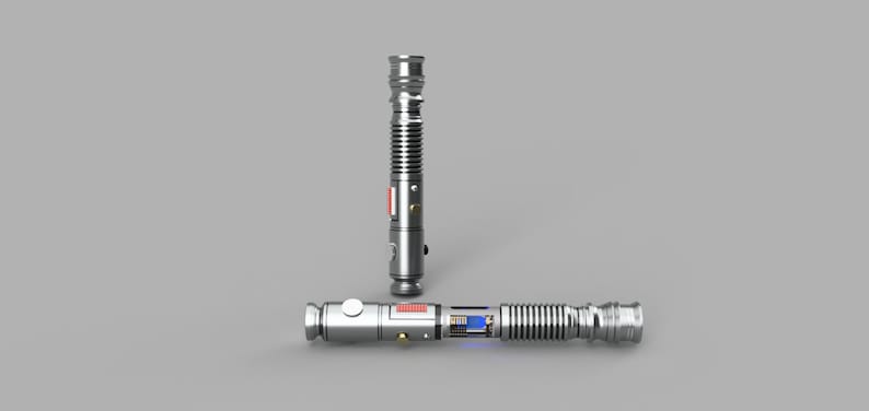 May include: A silver lightsaber with a blue blade and a silver hilt. The lightsaber is in two pieces, with the hilt separated from the blade. The hilt has a red button and a silver knob.