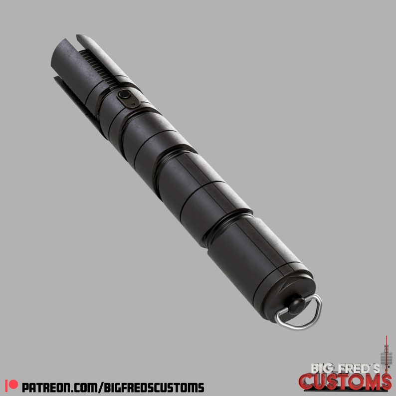 May include: A black lightsaber with a textured, segmented design and a silver ring at the end. The lightsaber is made of metal and has a sleek, modern look.