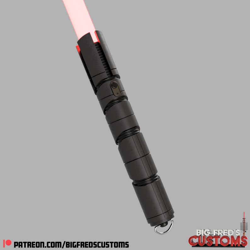 May include: A black lightsaber with a red blade and a silver button. The lightsaber has a textured, segmented design and a loop at the end.