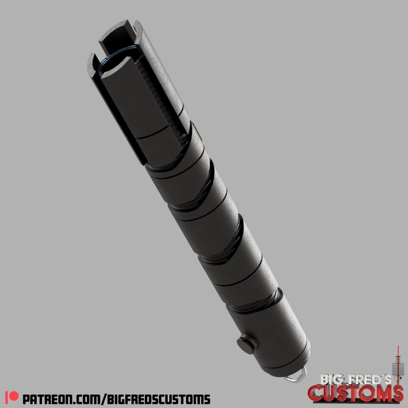 May include: A black lightsaber hilt with a segmented design. The hilt has a silver ring at the top and a small, round, silver button near the bottom. The hilt is made of metal and has a textured surface.