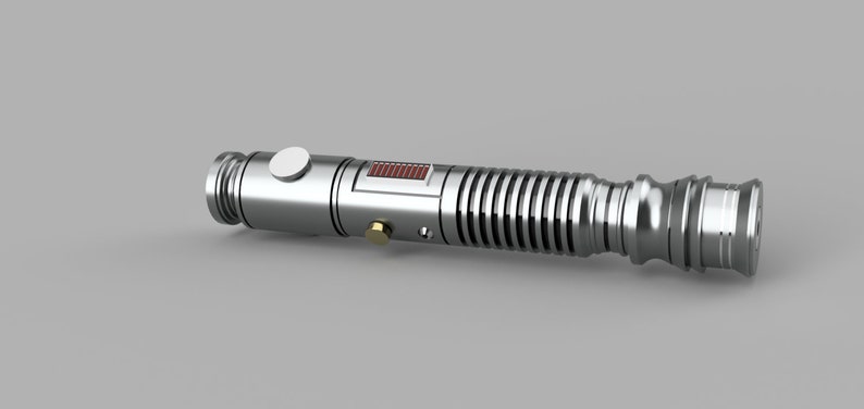 May include: A silver lightsaber with a black and red detail on the handle. The lightsaber has a ribbed texture and a black button on the side.
