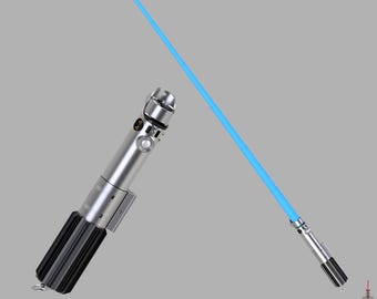 May include: A silver and black lightsaber with a bright blue blade. The hilt has detailed metallic components and a ribbed black grip. The image includes the text "BIG FRED ST CUSTOMS" and a website address.