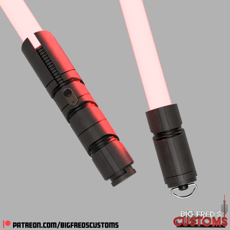 May include: Two black lightsaber hilts with red blades. The hilts have a textured, metallic finish and are designed with a series of grooves and ridges. The hilts are both in a vertical position, with the blades extending upwards. The blades are a bright red color and are emitting a glow.