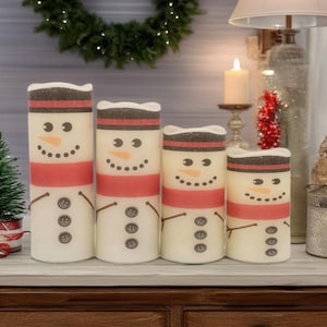 Snowmen red flameless LED candle, an adorable way to decorate for the Holiday season without the risk of flame, remote option available