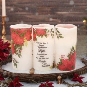 Christmas flameless candle gifts.  Personalized real wax battery operated vanilla scented flameless candles with poinsettia