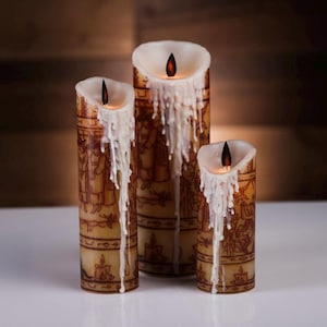 May include: Three brown and white pillar candles with a flickering flame and dripping wax. The candles have a decorative design with brown accents.