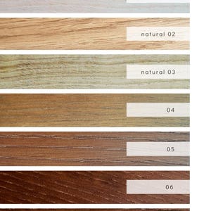 May include: Seven wood base color options for furniture. The colors range from light to dark, with options like natural, white, and brown.