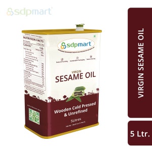 May include: A 5-liter can of virgin sesame oil. The can is red and gold with a label that says "Virgin Sesame Oil" and "Wooden Cold Pressed & Unrefined".