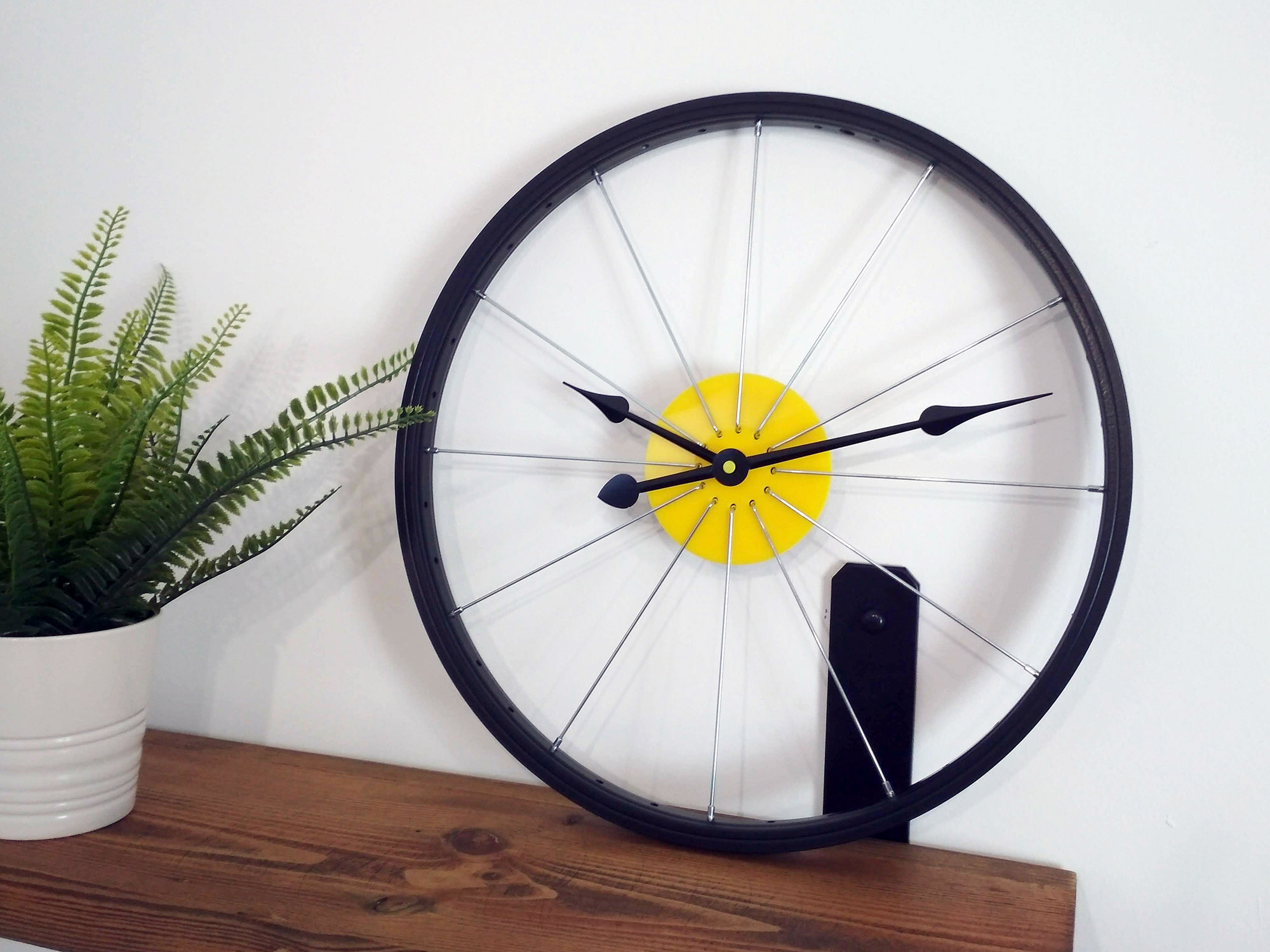 Bike wheel on sale clock