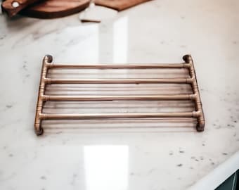 Large Copper pan trivet with protective feet,