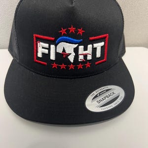 Trump Fight Puff Embroidered Mesh Back Flat Bill Trucker Hat in Black