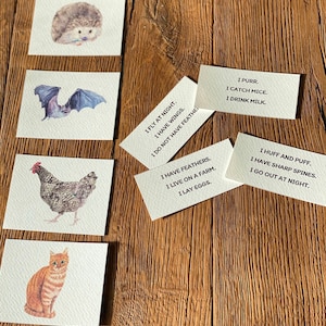 May include: A set of six cards with animal illustrations and descriptions. The cards are white with black text. The animals include a hedgehog, a bat, a chicken, a cat, and two cards with text only.