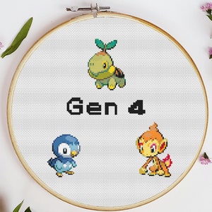 May include: A white embroidery hoop with a cross-stitch design featuring three Pokemon characters from Generation 4. The characters are Turtwig, Chimchar, and Piplup. The text "Gen 4" is stitched in black.