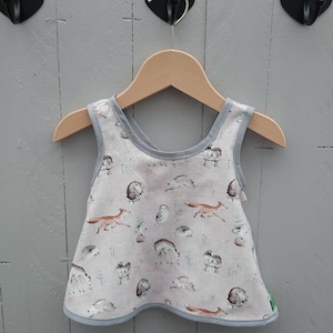 Apron dress tunic forest animals made of fine cord for children and babies gift for baptism or birth
