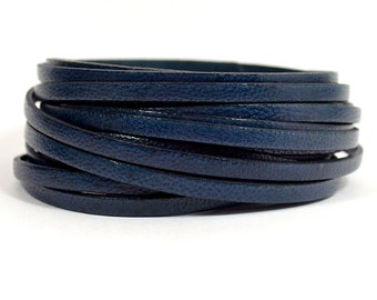 May include: A roll of dark blue leather cord, perfect for crafting jewelry or other projects.