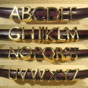 Letras del alfabeto Regaliz bañadas en oro
