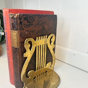 Vintage Brass Harp Bookends Set MCM decor  bookends vintage brass bookends in the shape of a harp set brass book ends a musical instrument