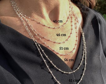 Schakelketting met kralen van 925 sterling zilver.