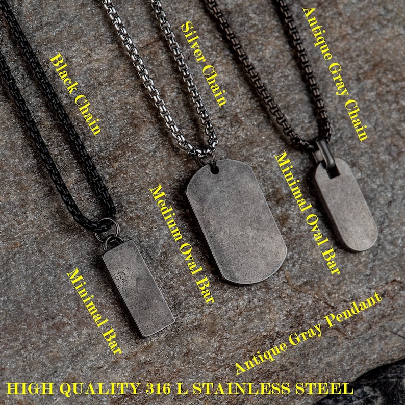 May include: Four different chain styles with pendants. The chains are black, silver, and antique gray. The pendants are a small rectangular bar, a medium oval bar, a large oval bar, and a small oval pendant.