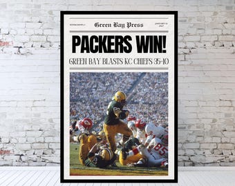 May include: A vintage newspaper headline announcing the Green Bay Packers win over the Kansas City Chiefs in Super Bowl I. The headline reads "Packers Win!" and "Green Bay blasts KC Chiefs 35-10". The image shows a black and white photo of the game with players in action.