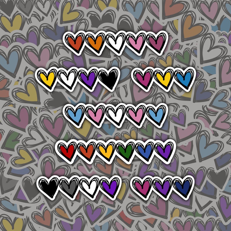 Puede incluir: Un conjunto de 48 pegatinas de coraz&oacute;n de colores con una variedad de colores, incluyendo rojo, naranja, amarillo, verde, azul, morado, rosa, negro y blanco. Los corazones est&aacute;n dispuestos en filas de ocho, con cada fila presentando un color diferente.