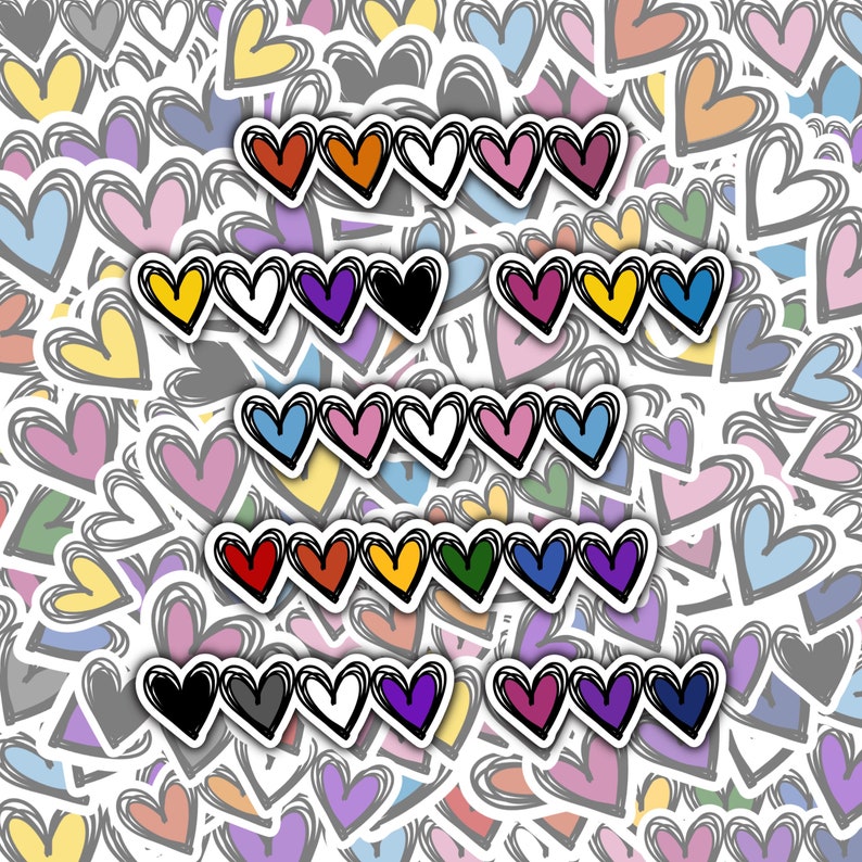 Puede incluir: Un conjunto de pegatinas en forma de coraz&oacute;n de colores con una variedad de colores, incluyendo rojo, naranja, amarillo, verde, azul, morado, negro, blanco y gris. Los corazones est&aacute;n dispuestos en filas, con cada fila que contiene un color diferente.