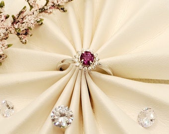 Rosa safirring: Haloring i 0,48 karat sterlingsilver, storlek 7